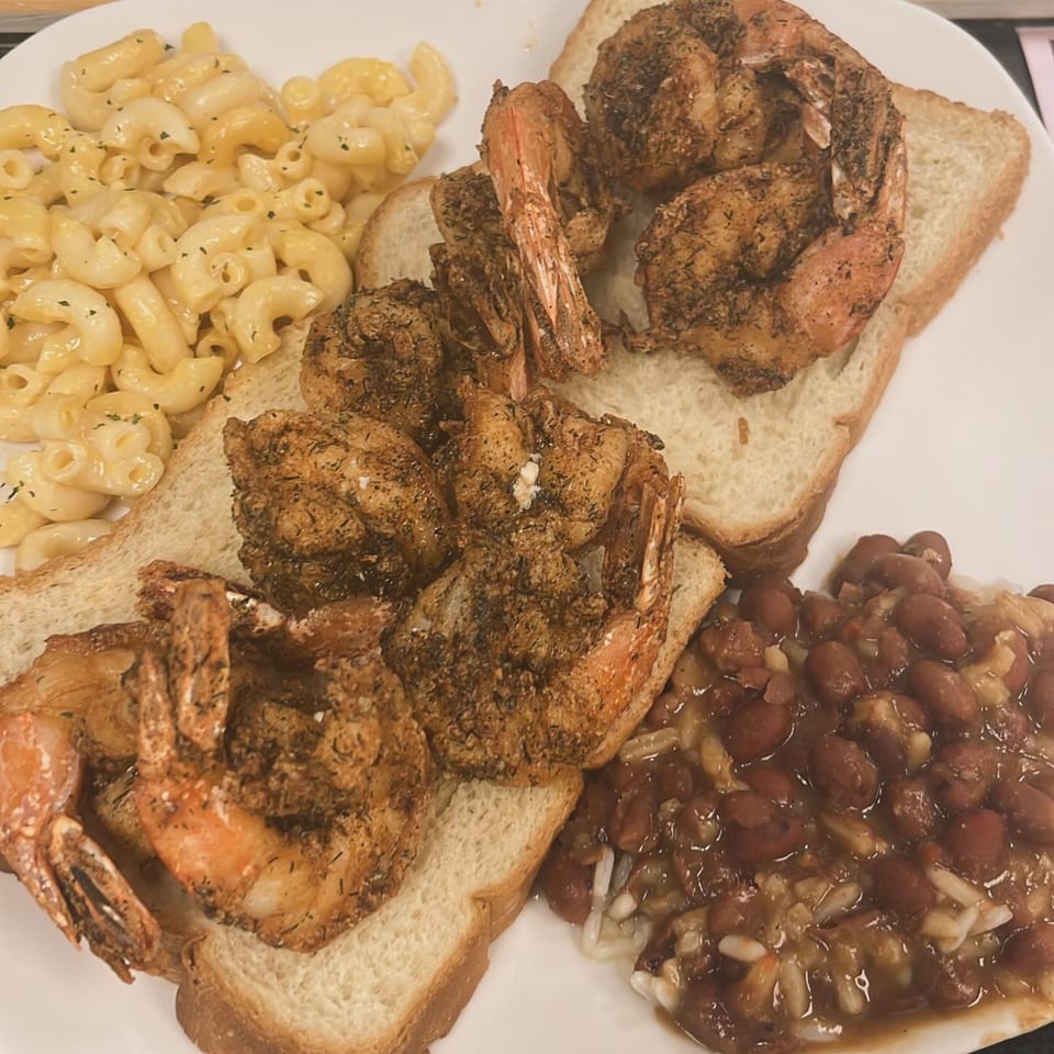 Lutfi's Raymore seafood platter with fried shrimp, macaroni and cheese, and red beans and rice.